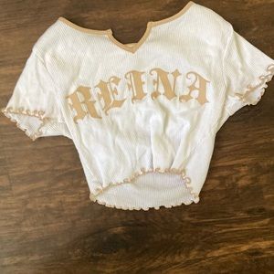 White and gold cropped shirt